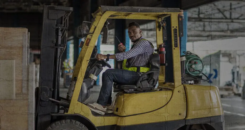 Forklift Operator Looking at Camera